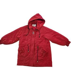 vintage-style red hooded jacket features an embroidered graphic of Sailor Moon